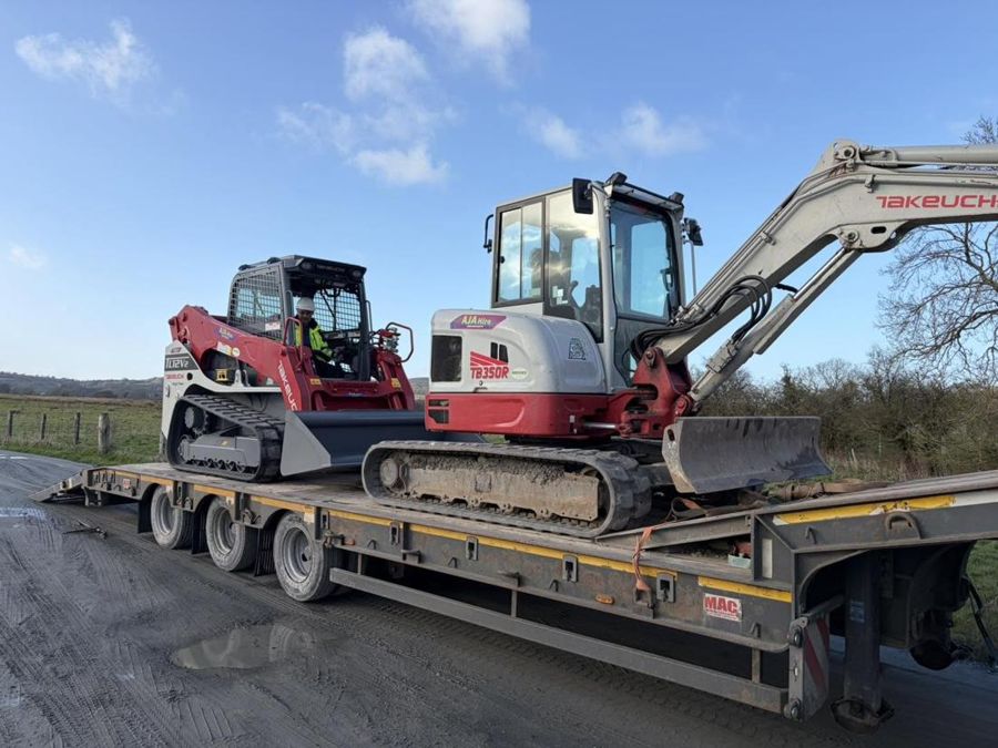 Takeuchi track loader on an AJA Hire low loader